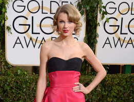 FILE - This Jan. 12, 2014 file photo shows singer Taylor Swift at the 71st annual Golden Globe Awards in Beverly Hills, Calif. A Los Angeles judge granted...